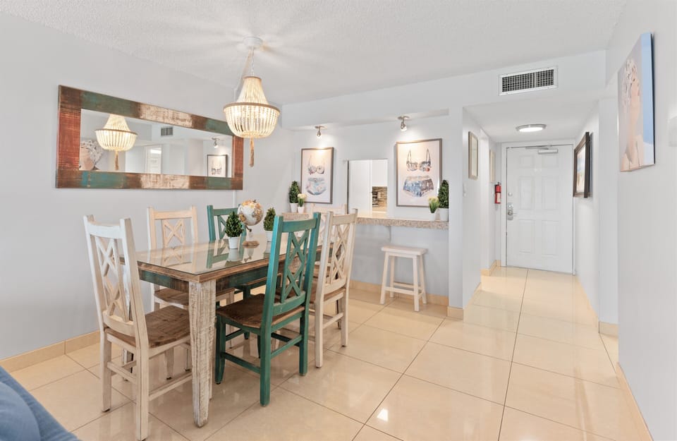 Gather around this charming dining table for a meal with loved ones