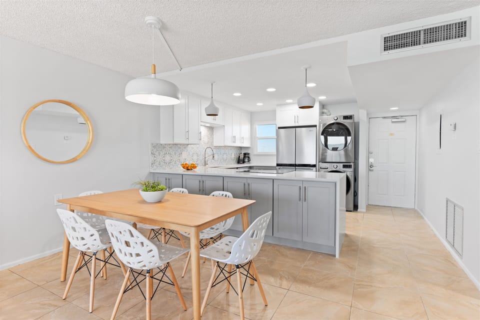 Gather around the dining table that seats six with friends or family