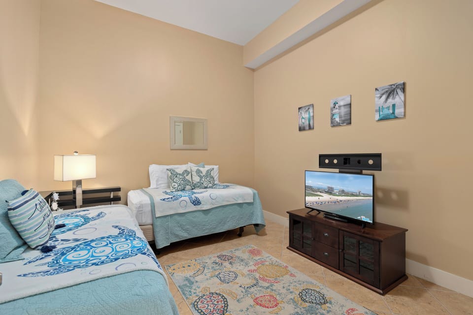 "Sea Turtle" 3rd bedroom has 2 twin beds and a Roku TV plus DVD player