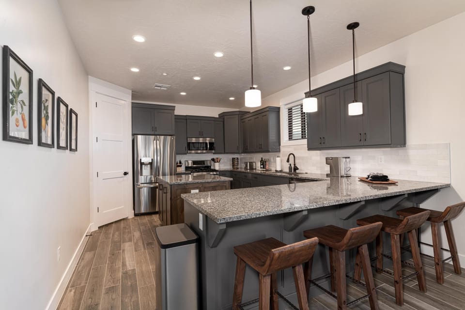 Brand new kitchen with island and additional seating for 4