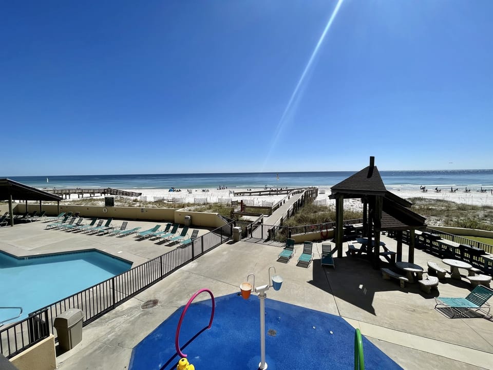 View of the kiddie pool and grilling area from the balcony!