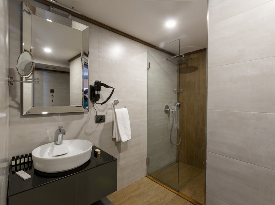 Hair dryer, slippers, towels, soap