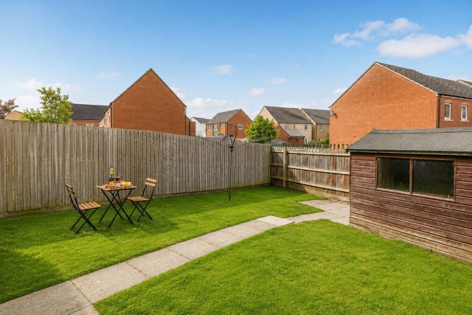 Private garden with outdoor seating.
