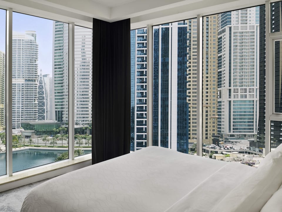 Premium Suite, 1 King Bed (Free Beach Access) | Egyptian cotton sheets, premium bedding, down comforters, minibar
