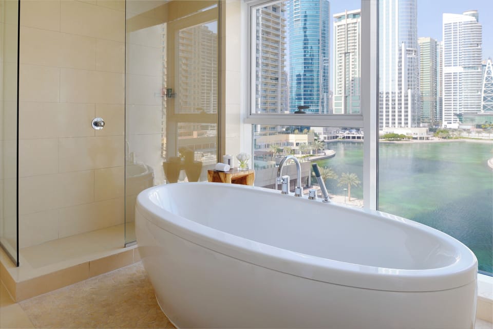 Premium Suite, 1 King Bed (Free Beach Access) | Bathroom | Combined shower/tub, deep soaking tub, rainfall showerhead