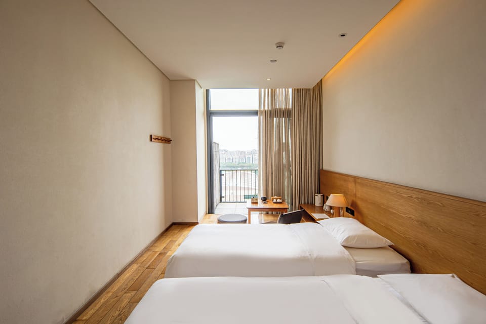 WuTong Twin Room | In-room safe, individually decorated, blackout drapes, free WiFi