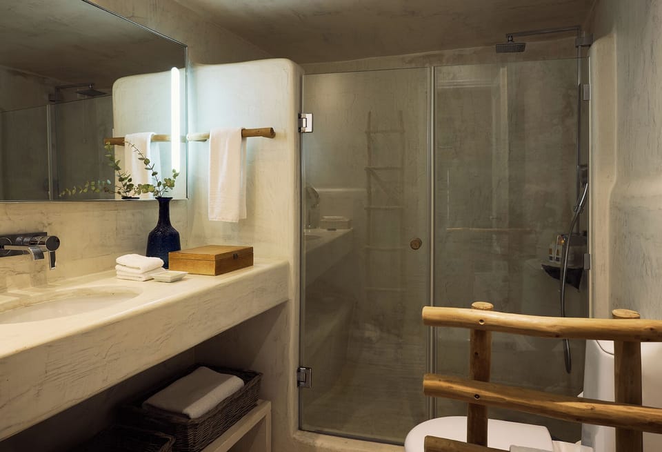 Suite, Sea View ((Outdoor Jetted Plunge Pool) Caldera) | Bathroom | Designer toiletries, hair dryer, bathrobes, slippers