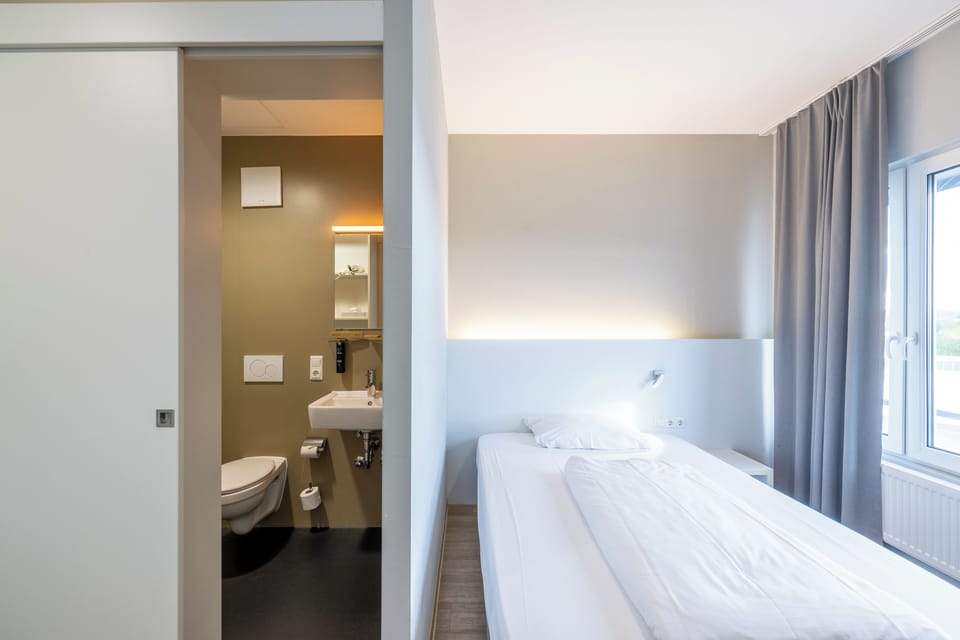 French Room | Premium bedding, pillowtop beds, desk, blackout drapes