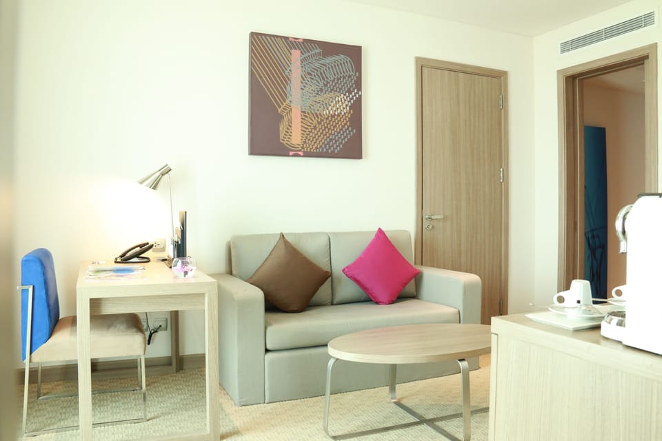 Executive Suite, 1 King Bed | Living area | LCD TV
