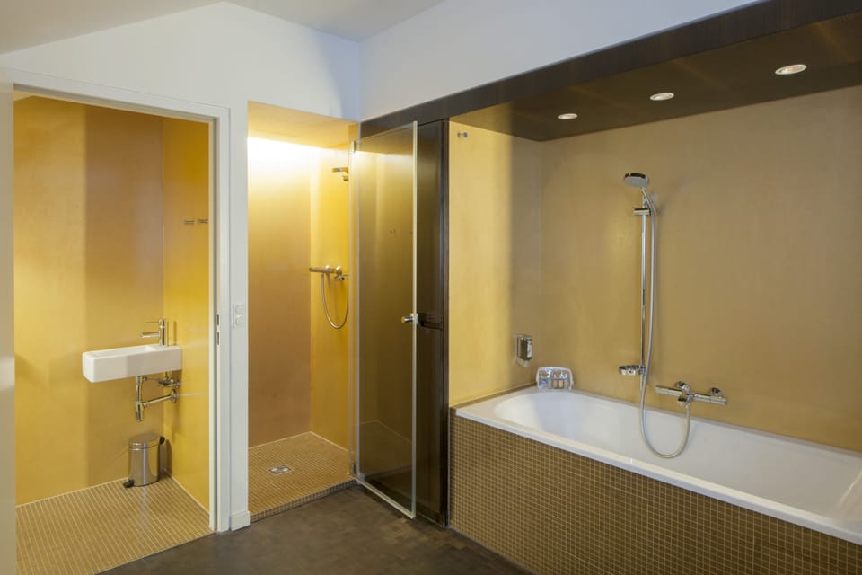 Deluxe Double Room | Bathroom | Hair dryer, slippers, towels, soap