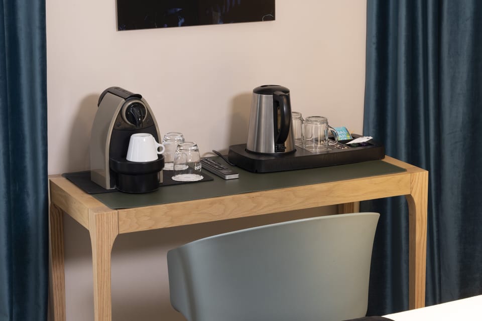 Superior Double Room | Minibar, in-room safe, desk, blackout drapes