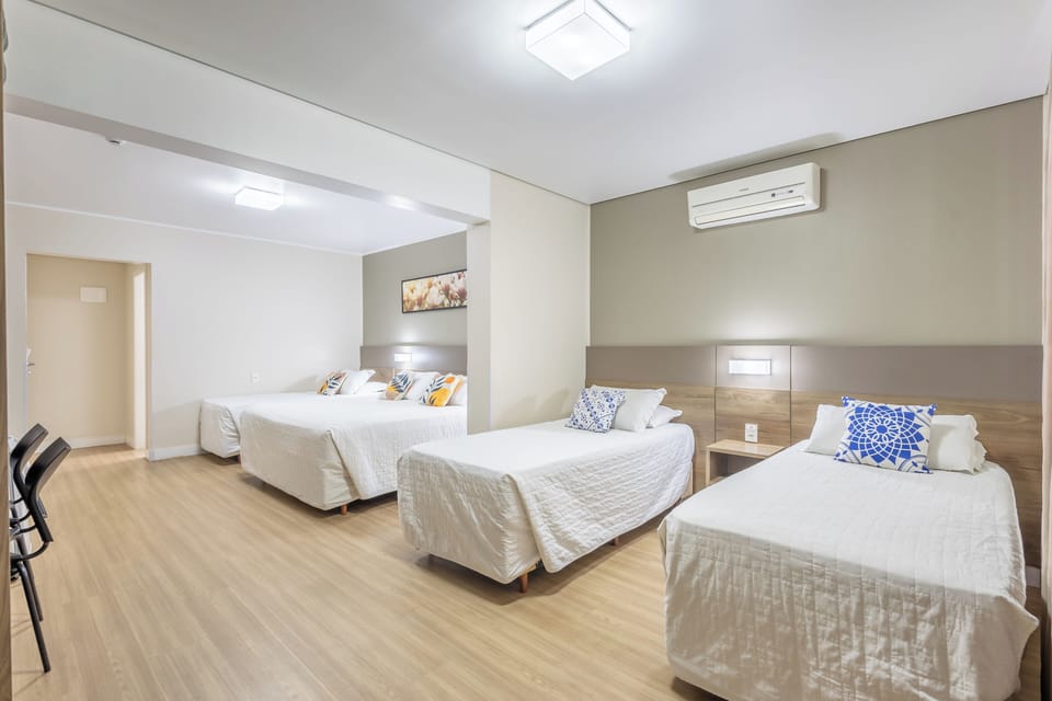 Family Room | Minibar, in-room safe, blackout drapes, iron/ironing board