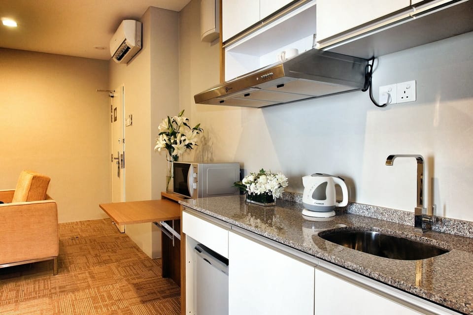 Suite | Private kitchen | Microwave, electric kettle
