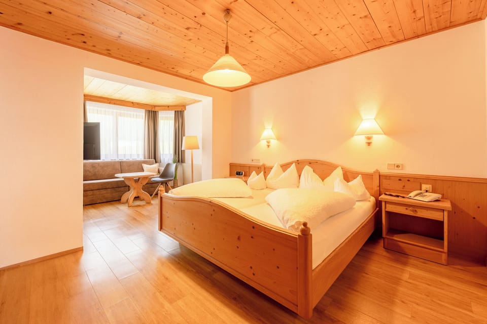 Standard Quadruple Room, 1 Bedroom, Balcony, Mountain View | WiFi (free), bed sheets