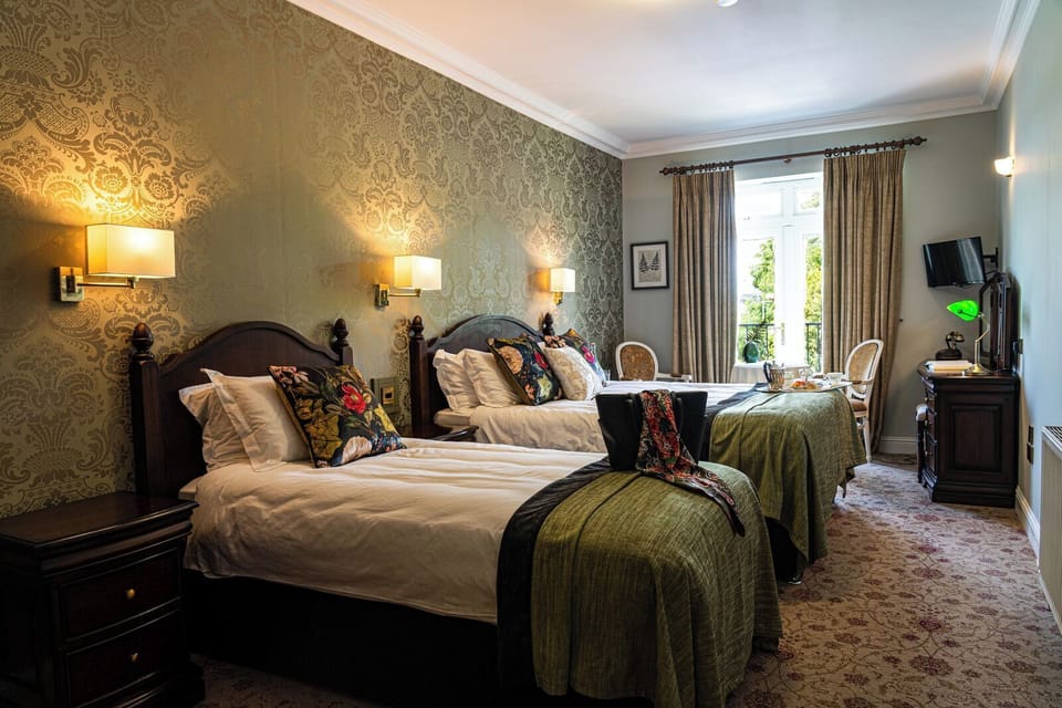 Premium bedding, desk, blackout drapes, iron/ironing board (on request)