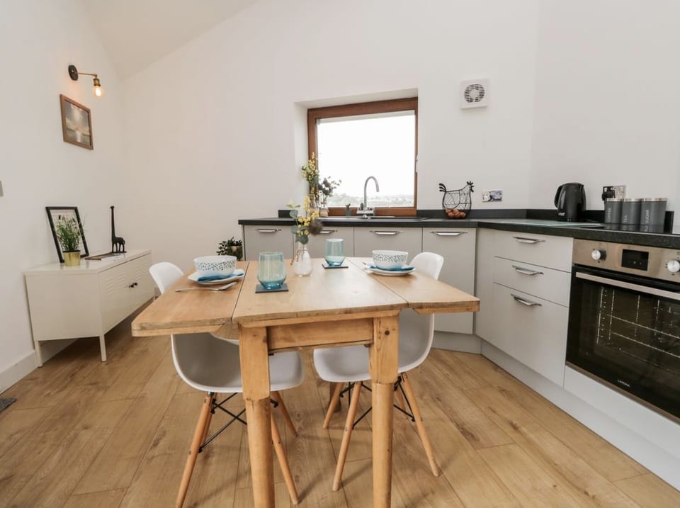 Open plan kitchen and dining with beautiful views out towards Arnside 