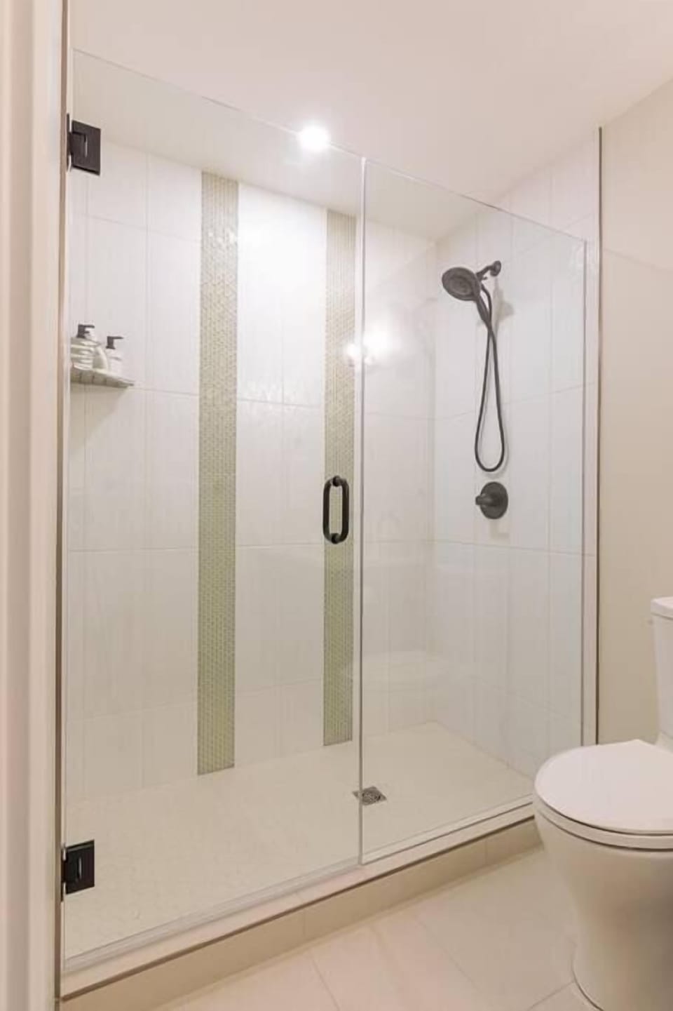 Enjoy a refreshing rinse in the modern walk-in shower in the master ensuite bathroom