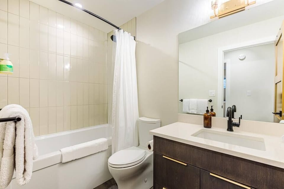 Downstairs bathroom complete with soaker tub and shower