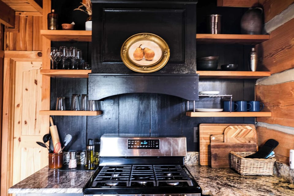 Designer Kitchen stocked with EV olive oil, pink Himalayan salt & black peppercorn grinders, wine glasses, cooking ware ready for your feast!