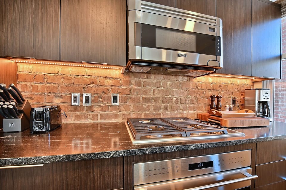 High End Appliances and Granite Countertops Make for the Ideal Gourmet Kitchen