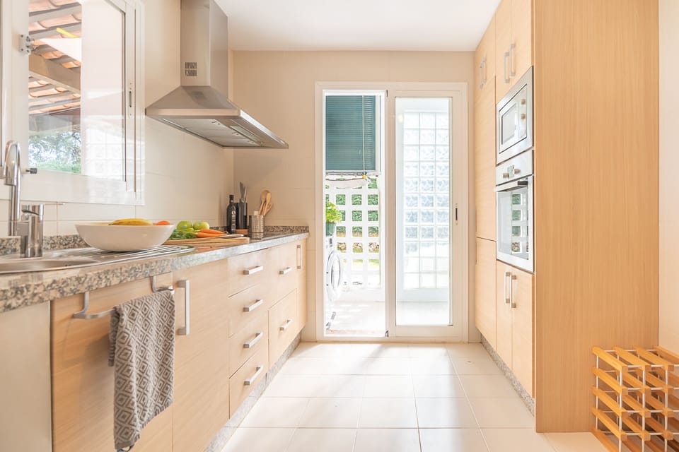 Kitchen with laundry access