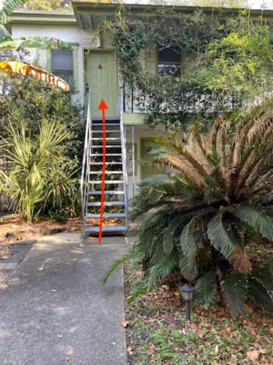 Your unit is the upstairs unit. Continue up the stairs and enter the door code.