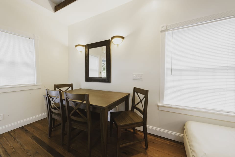 The dining table has seating for four.