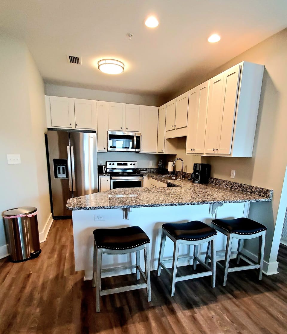 Kitchen with seating for 3.