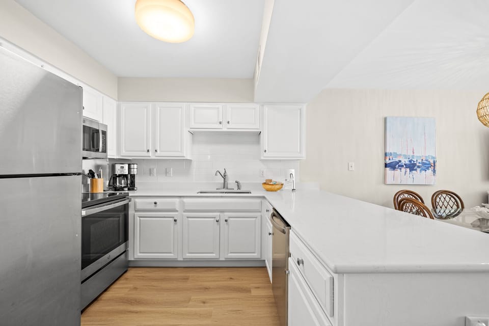 Stocked kitchen with all the necessities and new stainless appliances!