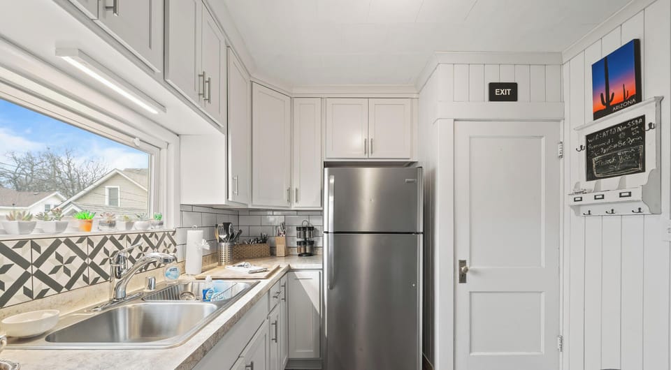 Full kitchen with dishwasher and gas stove