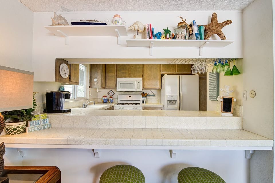 The kitchen opens out to the main living area, making meal prep a social affair!
                