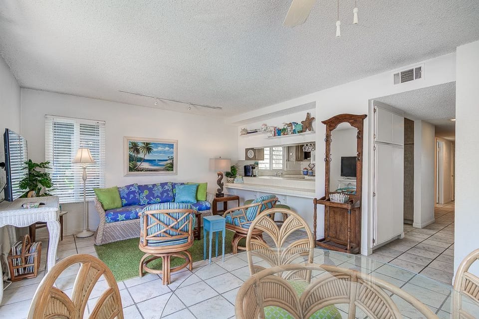 With plenty of natural light and Tommy Bahama-inspired decor, this home is sure to sweep you off your feet and into vacation mode.
                