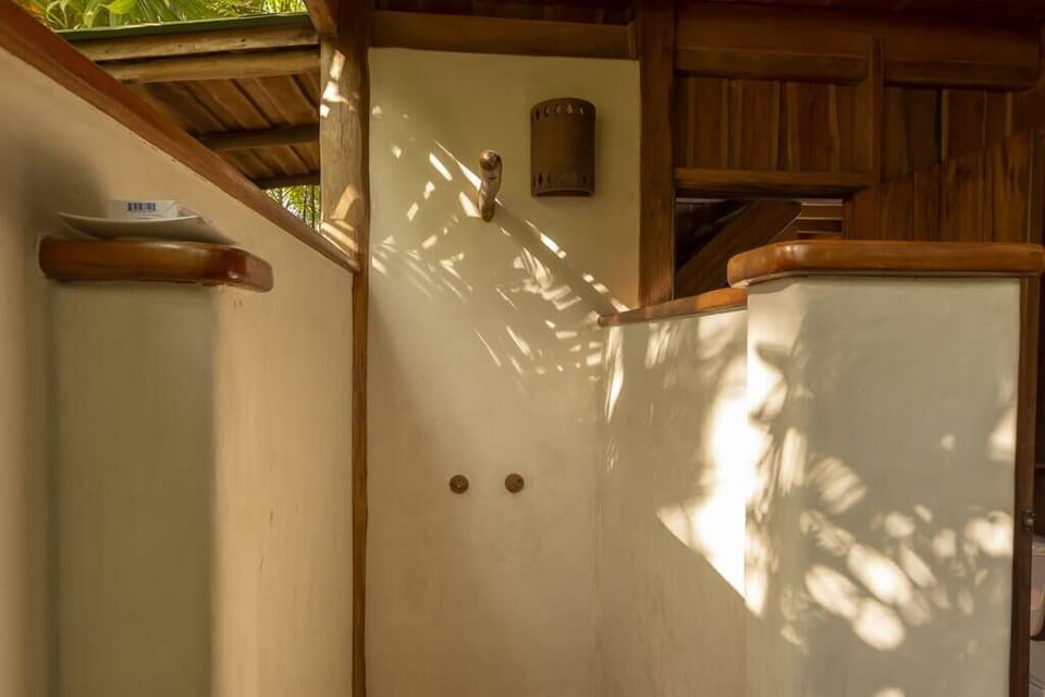 The rustic and minimalist open-air shower