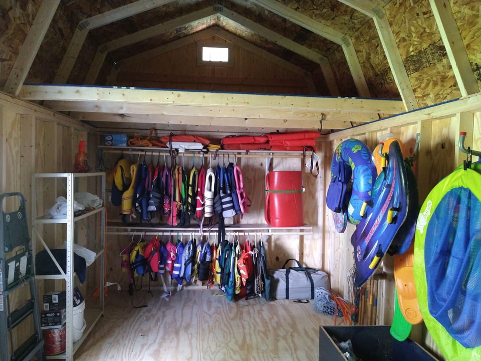 Life jackets, oars, yard games.
