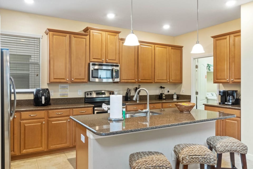 Spacious Vacation Home with Pool & Spa Near Disney (515)