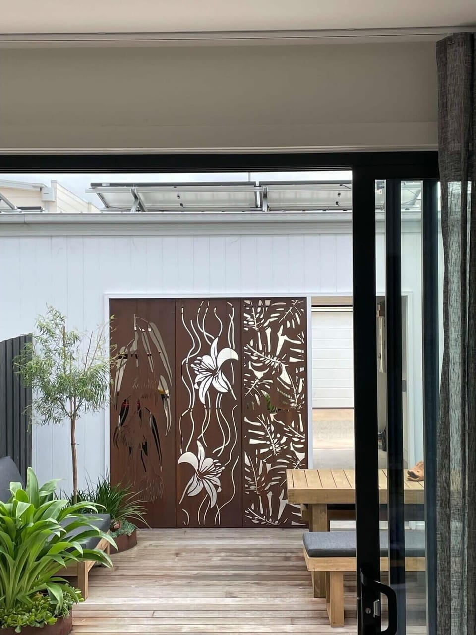 Ideally oriented to capture north sunshine in the kitchen and casual dining space, push open the stacker sliding doors to extend the living space in the private deck courtyard and BBQ area