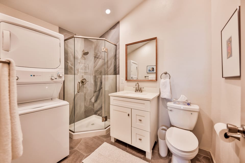Upstairs loft bathroom with shower. WASHER/DRYER HERE AS WELL!