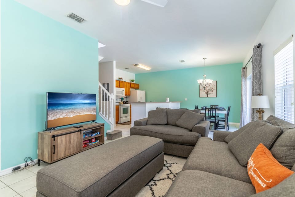 Open Concept with Easy Access to Kitchen, Dining, And Pool Area!