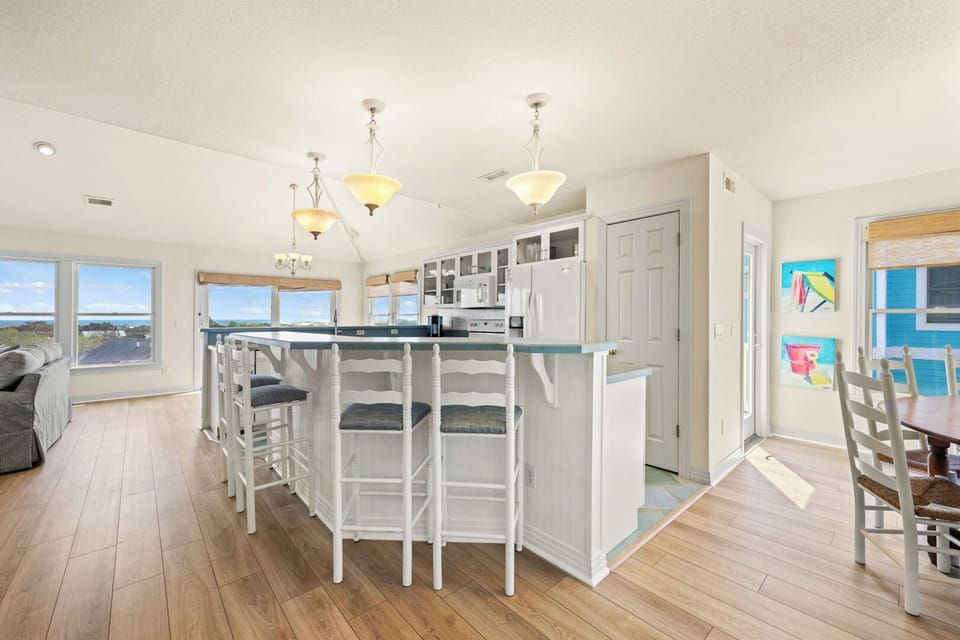 Large Kitchen with Bar Seating on Second Level