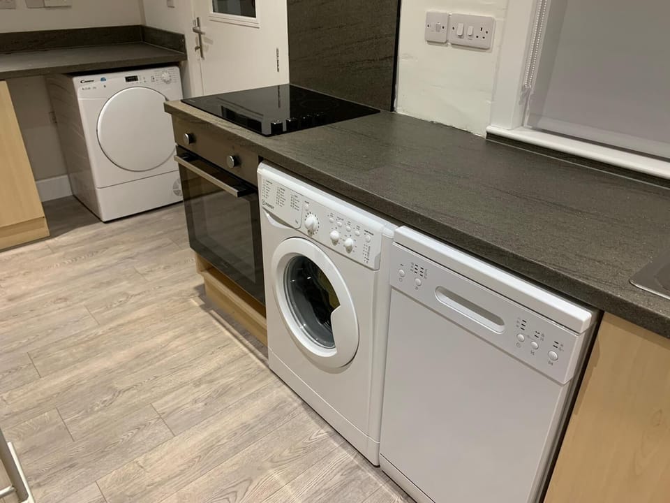 Kitchen includes essentials; tumble dryer, washing machine, dishwasher and oven.