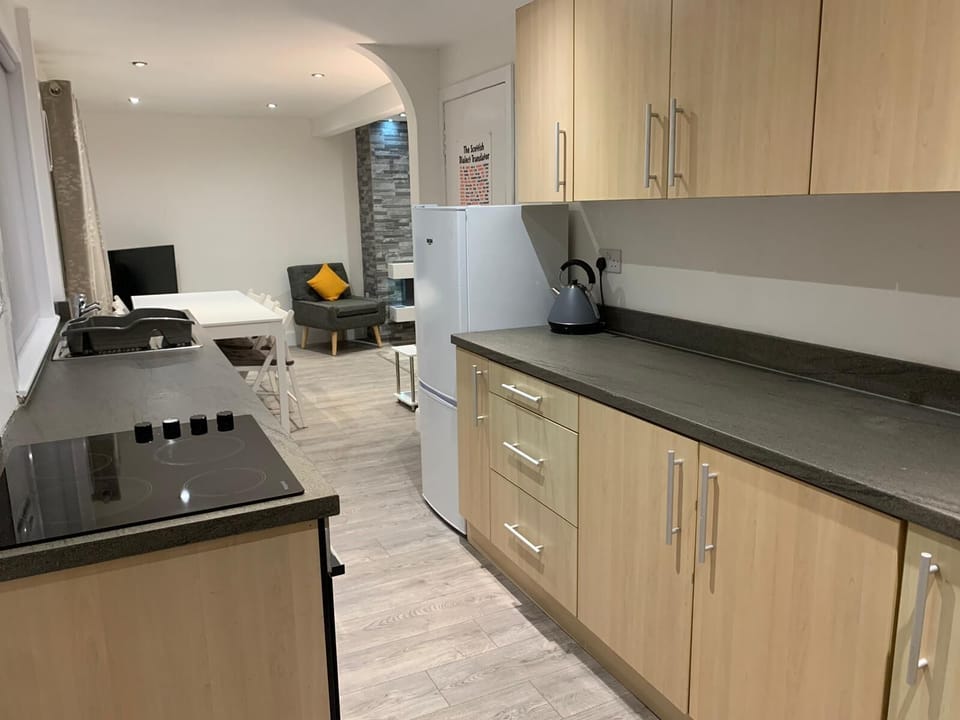 Spacious open plan kitchen into the lounger diner area.