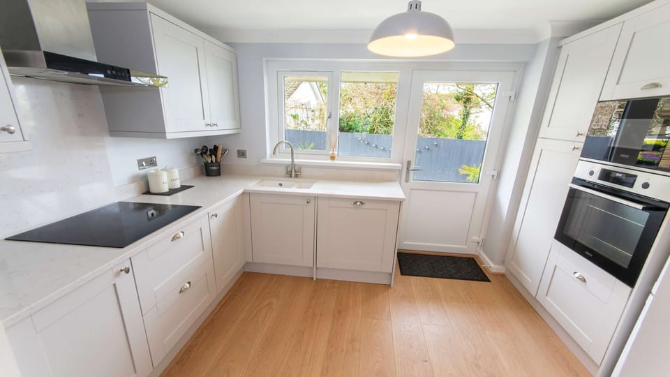Kitchen with doors to the rear garden