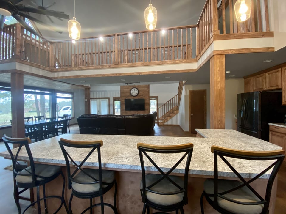 looking into the living room; above catwalk