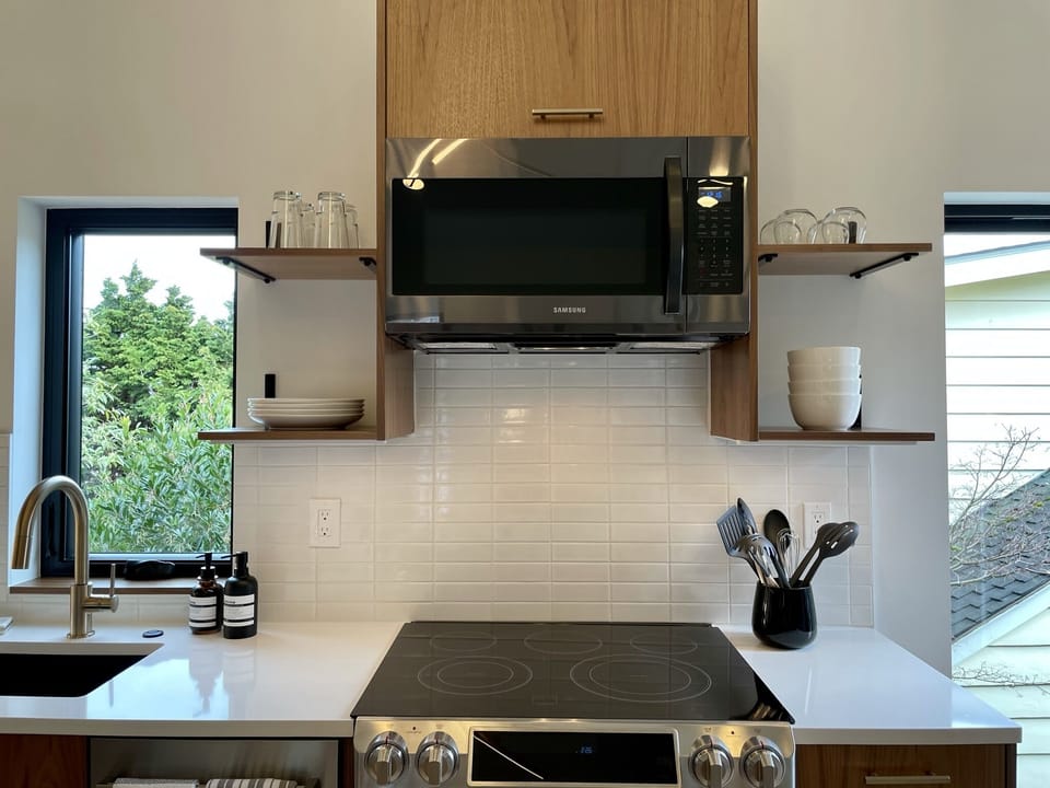 Full Sized high end electric range so you can stay Instagram trendy with a fresh sourdough. 