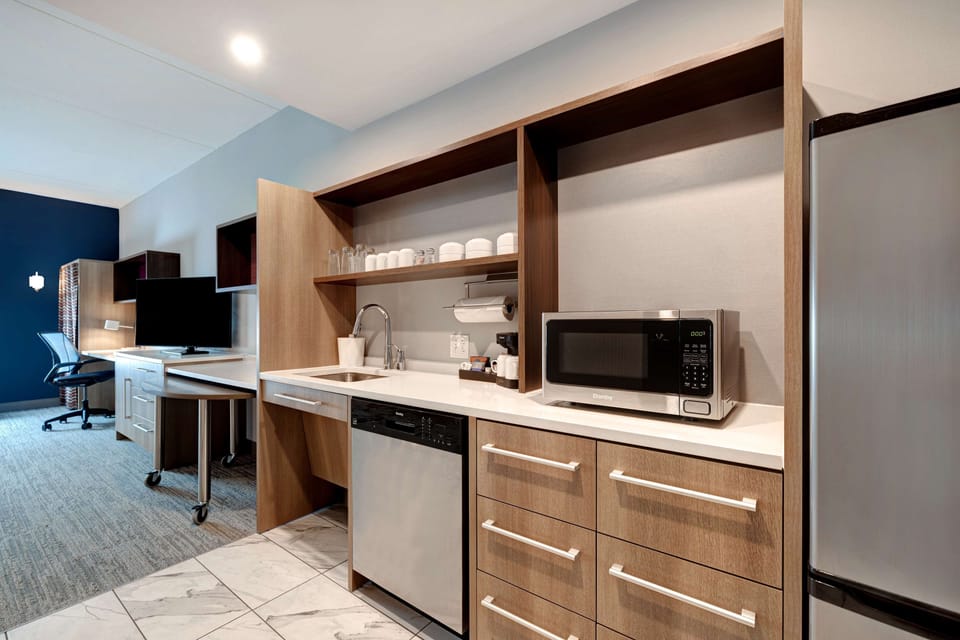 Coffee/tea maker, shared microwave