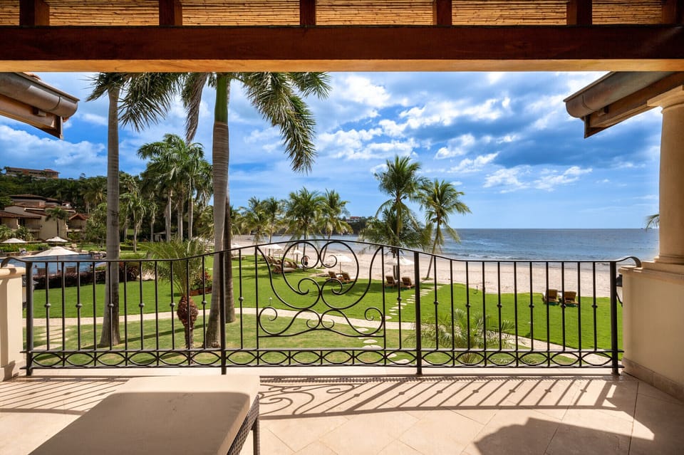 Relax in a master bedroom terrace with private ocean views
