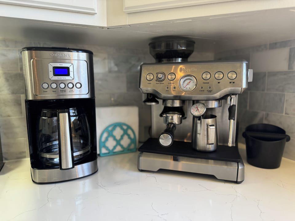 We provide drip coffee, teas, creamers & have a Breville Espresso maker!