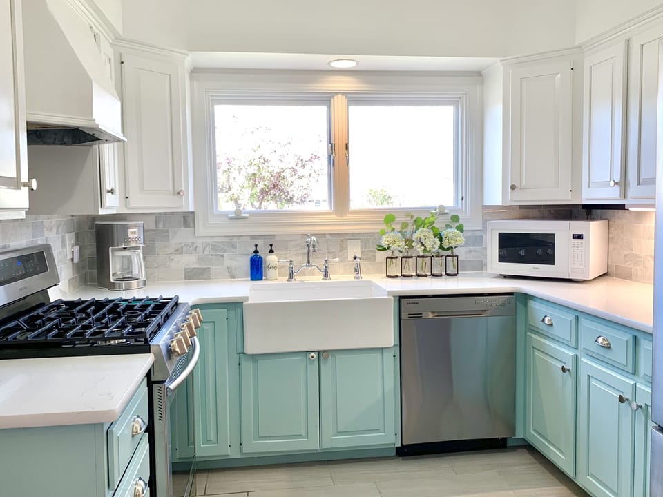 Fully stocked kitchen! Quartz countertops, stainless steel appliances
