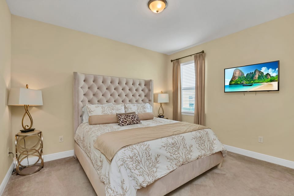 This master suite boasts plush bedding and modern decor. Truly a comfort to make this a home away from home