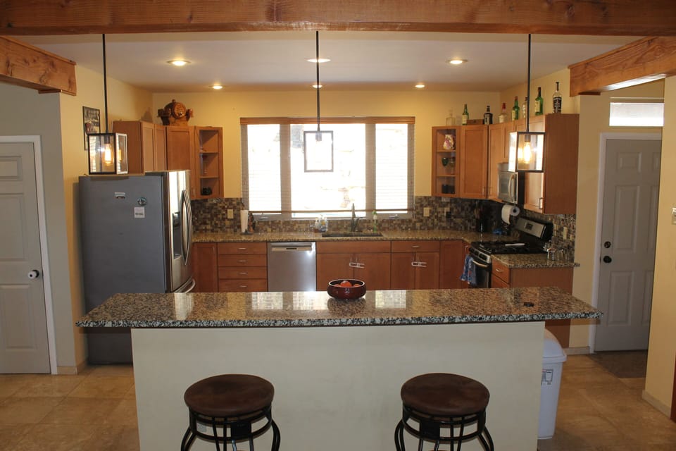 Large granite counter kitchen. 